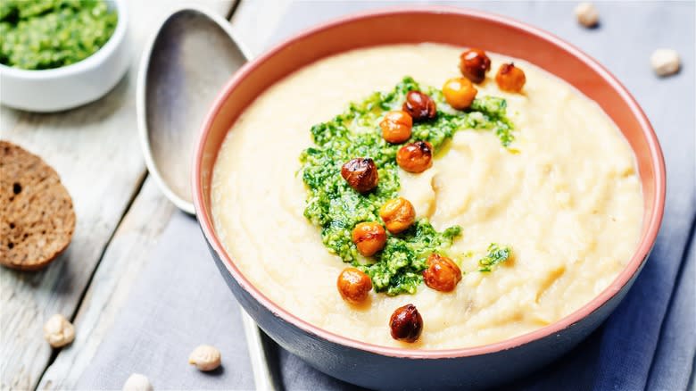 Soup topped with pesto