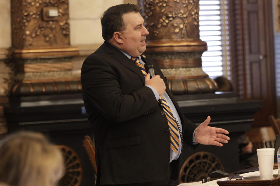 Kansas state Sen. Rob Olson, R-Olathe, speaks in favor of a bill that would restrict the use of ballot drop boxes in elections at the Statehouse, Wednesday, March 23, 2022, in Topeka, Kan. Olson is chair of the Senate committee that handled the bill. (AP Photo/John Hanna)