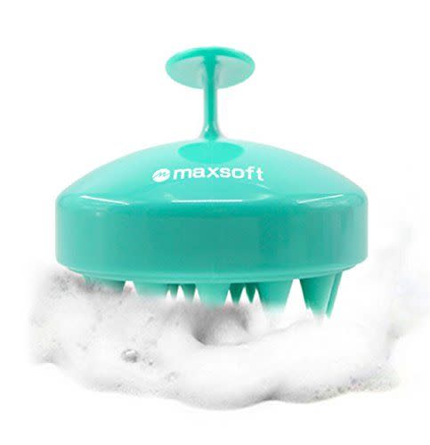 <p><strong>Maxsoft</strong></p><p>amazon.com</p><p><strong>$7.98</strong></p><p><a href="https://www.amazon.com/dp/B074ZDXFL6?tag=syn-yahoo-20&ascsubtag=%5Bartid%7C10060.g.38735469%5Bsrc%7Cyahoo-us" rel="nofollow noopener" target="_blank" data-ylk="slk:Shop Now;elm:context_link;itc:0;sec:content-canvas" class="link ">Shop Now</a></p><p>This is a straight-forward, inexpensive pick for someone who isn’t looking for bells and whistles. This scalp massager works best in the shower for use with shampoo. The massager is manually operated, and features soft, thick silicone bristles that stimulate blood flow, deep clean, and exfoliate. It is designed specifically for thick hair, and is suitable for sensitive scalps. </p><p>Reviewers say it's great for removing product buildup, addressing dry scalp issues, and smoothing hair. </p>