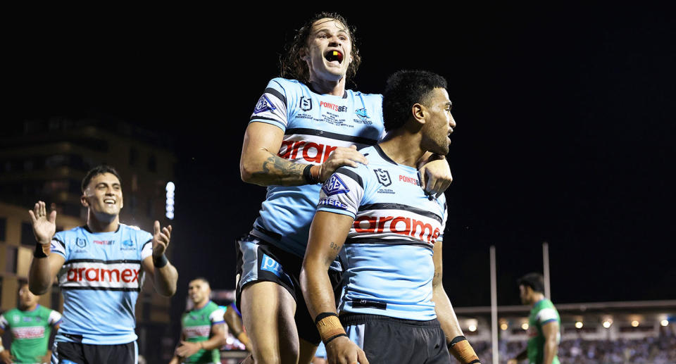 Nicho Hynes celebrates with Sharks teammates during their huge win over Canberra in round eight of the NRL. Pic: Getty