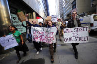 Occupy Wall Street (OWS) is an ongoing series of demonstrations initiated by the Canadian activist group Adbusters which began September 17, in Zuccotti Park, located in New York City’s Wall Street financial district. The protests are against social and economic inequality, high unemployment, greed, as well as corruption, and the influence of corporations - particularly from the financial services sector - on government. (Emmanuel Dunand/AFP/Getty Images)