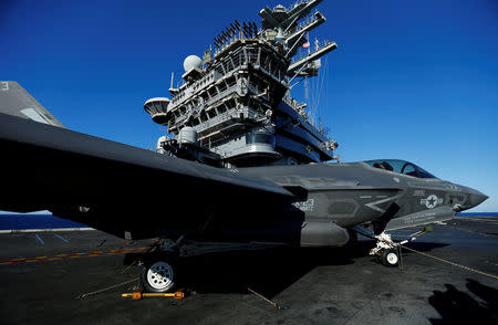 FILE PHOTO: A Lockheed Martin Corp's F-35C Joint Strike Fighter is shown on the deck of the USS Nimitz aircraft carrier after making the plane's first ever carrier landing using its tailhook system, off the coast of California, November 3, 2014. REUTERS/Mike Blake/File Photo