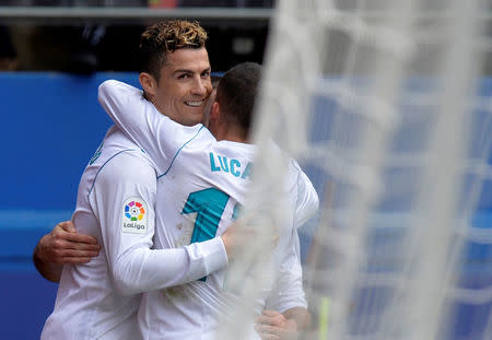 Soccer Football - La Liga Santander - Eibar vs Real Madrid - Ipurua, Eibar, Spain - March 10, 2018 Real Madrid’s Cristiano Ronaldo celebrates scoring their second goal with team mates REUTERS/Vincent West