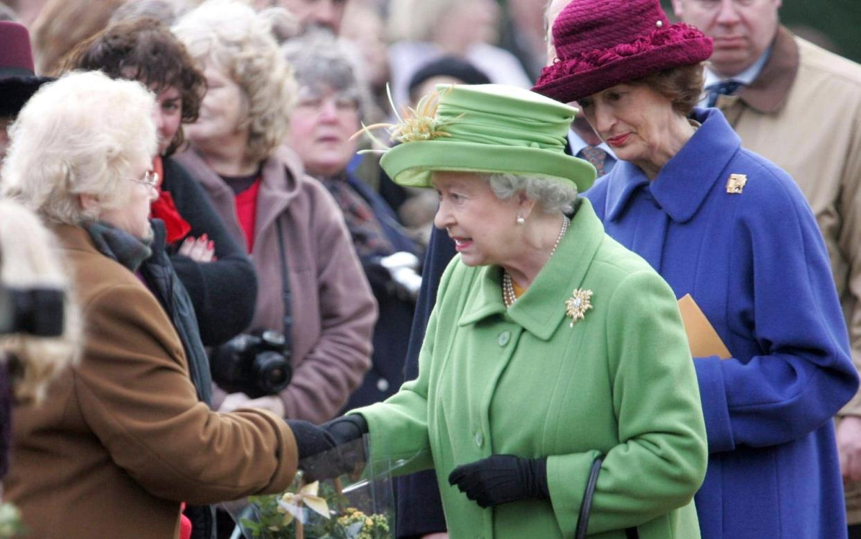 The Queen with lady-in-waiting Lady Susan Hussey (far right) during a 2005 walkabout at Sandringham House in Norfolk - Tim Rooke/Shutterstock