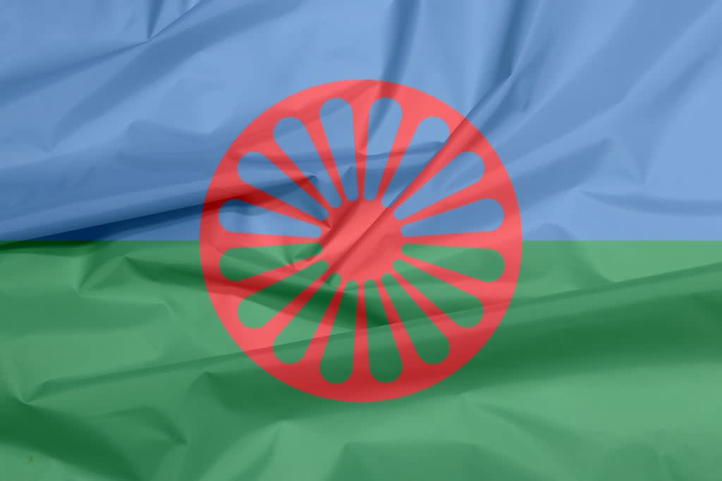 Romani communities (whose flag is shown here) have been in the UK since the 15th century  (Getty Images/iStockphoto)