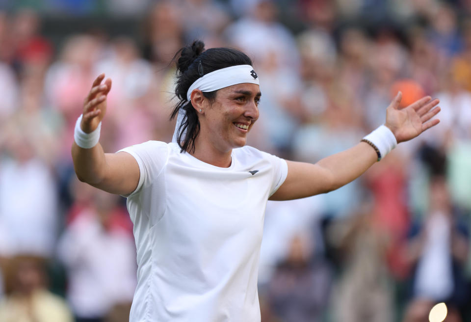 Seen here, Ons Jabeur celebrates after beating Marie Bouzkova in the Wimbledon quarter-finals. 