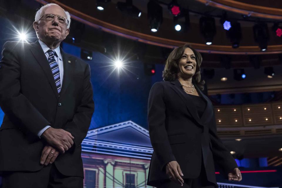 Democratic presidential hopefuls (fromL) US Senator for Vermont Bernie Sanders and US Senator for California Kamala Harris participate in the second Democratic primary debate of the 2020 presidential campaign season hosted by NBC News at the Adrienne Arsht Center for the Performing Arts in Miami, Florida, June 27, 2019. | Christopher Morris for TIME