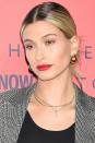 <p>To cheat your way to Hailey Baldwin's perfectly defined full pout, use a lip liner, like Nars' <a rel="nofollow noopener" href="https://www.spacenk.com/uk/en_GB/makeup/lips/lip-liner/precision-lip-liner-UK200019568.html?cm_mmc=PPC%7cGoogle%7cUK-_-Shopping-_-Nars-_-Nars&gclid=CjwKCAjwo_HdBRBjEiwAiPPXpJkyqy0HljxhpTdlPeUzox_zik2gvHhIVCsLg7zsDsurZLuopNq9HhoCbbMQAvD_BwE&gclsrc=aw.ds" target="_blank" data-ylk="slk:Precision Lip Liner in Juan-Les-Pins;elm:context_link;itc:0;sec:content-canvas" class="link ">Precision Lip Liner in Juan-Les-Pins</a>, just over your natural lip line and fill in your lips with the pencil. Then, apply your favourite red lipstick over the top - or try L'Oréal Paris' <a rel="nofollow noopener" href="https://www.lookfantastic.com/l-oreal-paris-color-riche-matte-addiction-lipstick-4.8g-various-shades/11425673.html?affil=thggpsad&switchcurrency=GBP&shippingcountry=GB&variation=11425675&thg_ppc_campaign=71700000026979850&adtype=pla&product_id=11425675&gclid=CjwKCAjwo_HdBRBjEiwAiPPXpNp47NMQUugMZgFOYrpd0PdkE7PTKq_vCUdchfx77zvfXXqZoka-BhoCadcQAvD_BwE&gclsrc=aw.ds&dclid=CKbWxaKD-d0CFU0YgQod5BAG6g" target="_blank" data-ylk="slk:Color Riche Matte Addiction Lipstick in Brick Rouge;elm:context_link;itc:0;sec:content-canvas" class="link ">Color Riche Matte Addiction Lipstick in Brick Rouge</a> - and add a hint of Glossier's <a rel="nofollow noopener" href="https://www.glossier.com/products/haloscope" target="_blank" data-ylk="slk:Haloscope Highlighter;elm:context_link;itc:0;sec:content-canvas" class="link ">Haloscope Highlighter</a> above your cupid's bow for further definition.</p>