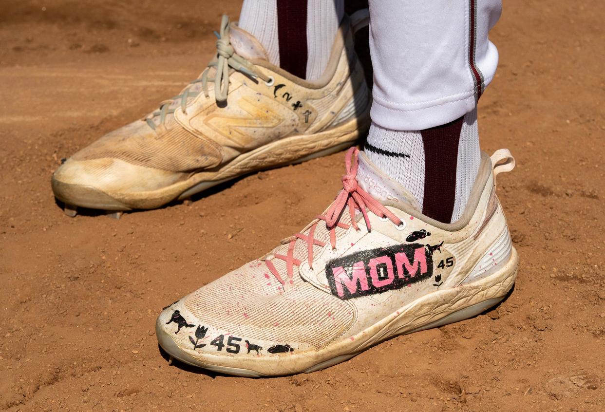 Mavrick Rizy’s cleats at Gaskill Field in Worcester Friday.