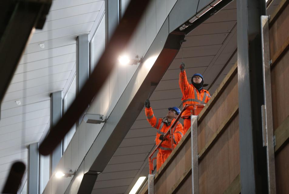 Workers paint steelwork along the new platform ten at London Bridge railway station, Southwark, London as the capital's oldest station undergoes rebuilding as part of the ï¿½6.5bn Thameslink Programme. PRESS ASSOCIATION Photo. Picture date: Monday November 24, 2014.  From Saturday 20 December 2014 to Sunday 4 January 2015 inclusive, Southern and Thameslink trains will not call at London Bridge. Also, from Monday 22 to Wednesday 24 December some Southeastern Charing Cross services will not call at London Bridge in the morning peak as work continues. Photo credit should read: Jonathan Brady/PA Wire