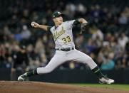 Oakland Athletics starting pitcher Daniel Mengden works against the Seattle Mariners during the first inning of a baseball game, Monday, Sept. 24, 2018, in Seattle. (AP Photo/John Froschauer)