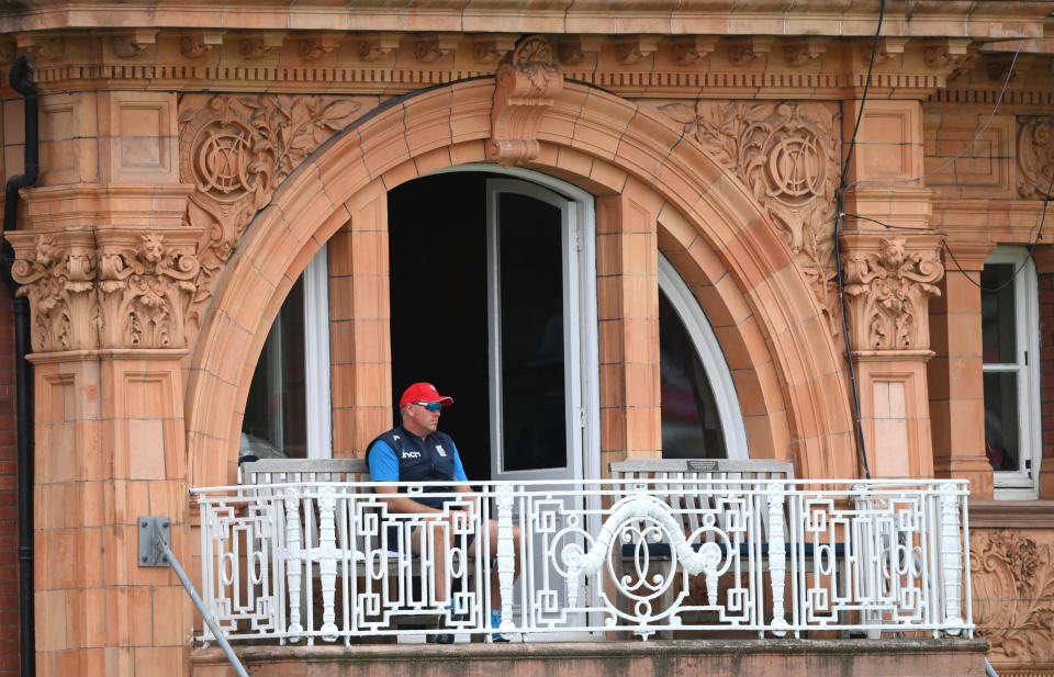 LONDON, ENGLAND - AUGUST 15: England coach Chris Silverwood looks on from the balcony during day four of the Second Test Match between England and India at Lord's Cricket Ground on August 15, 2021 in London, England. (Photo by Stu Forster/Getty Images)