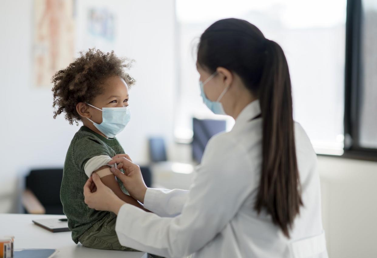 <span class="caption">Millions of U.S. children between the ages of 6 months and 4 years will soon be eligible for COVID-19 shots. </span> <span class="attribution"><a class="link " href="https://www.gettyimages.com/detail/photo/getting-a-bandage-after-a-vaccine-royalty-free-image/1358496301?adppopup=true" rel="nofollow noopener" target="_blank" data-ylk="slk:FatCamera/E+ via Getty Images;elm:context_link;itc:0;sec:content-canvas">FatCamera/E+ via Getty Images</a></span>