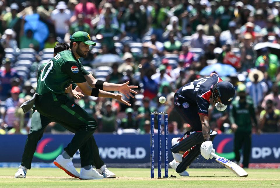 USA's Nitish Kumar successfully makes it to the crease to score a run during the ICC men's Twenty20 World Cup 2024 group A cricket match between the USA and Pakistan at the Grand Prairie Cricket Stadium in Grand Prairie, Texas, on June 6, 2024.