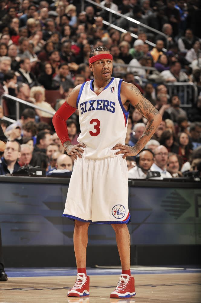 <p>Allen Iverson hits the court in red sneakers while playing in a Sixers game against the Los Angeles Lakers in Philadelphia, Pennsylvania on January 29, 2010. </p>