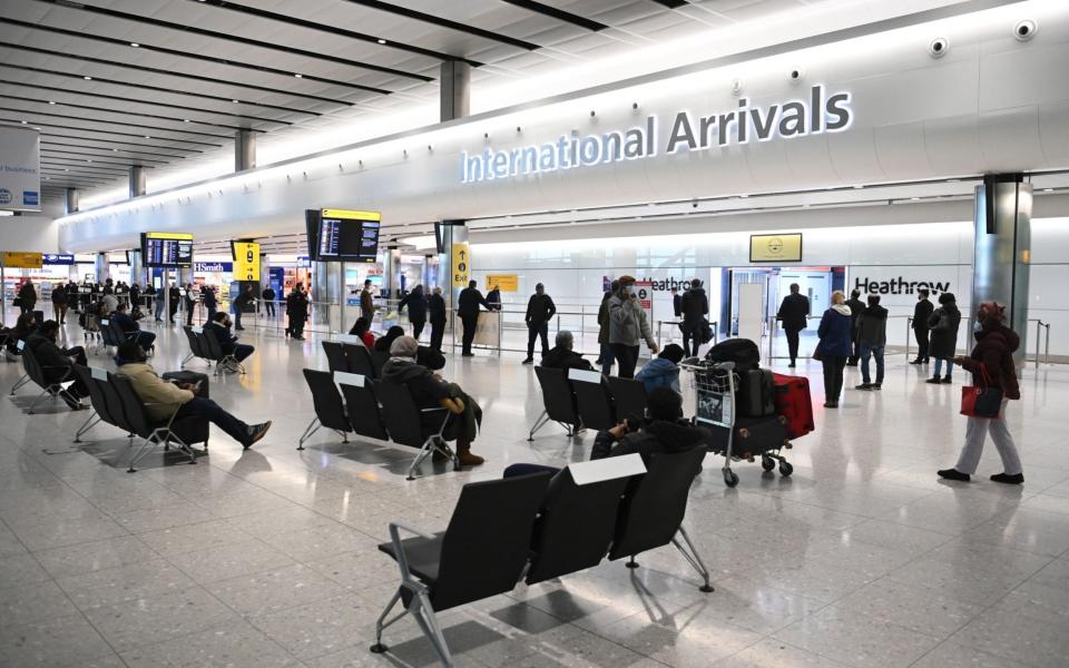 Passengers in the arrivals area at Heathrow Airport on Monday after the new rules were introduced - Neil Hall/EPA-EFE/Shutterstock