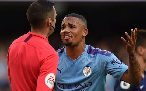 Gabriel Jesus appeals to the ref after his late winner is over-turned - Credit: AFP