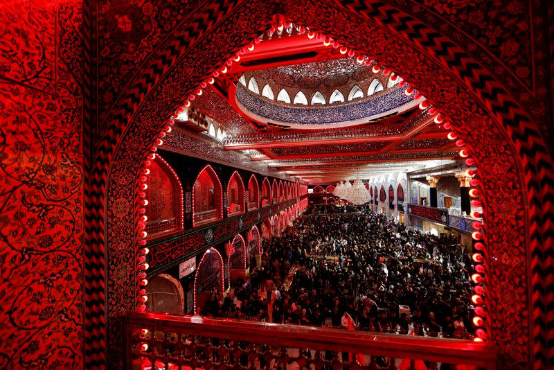 FILE PHOTO: Shi'ite Muslim pilgrims take part in a mourning ceremony, ahead of the holy Shi'ite ritual of Arbaeen, in Kerbala