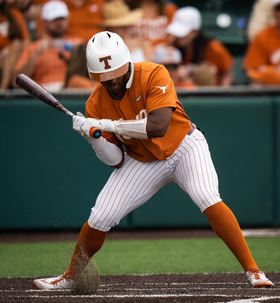 Dylan Campbell watches the ball hit the turf in the third inning of the first game Saturday. The Longhorns were swept in their three games with Oklahoma. "It's a little surprising because we have been clicking on all cylinders," Campbell said.