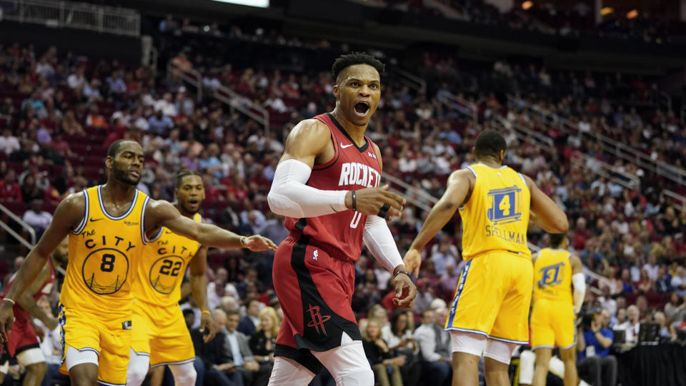 Houston Rockets' Russell Westbrook (0) looks for a foul call after making a basket against the Golden State Warriors during the second half of an NBA basketball game Wednesday, Nov. 6, 2019, in Houston. The Rockets won 129-112. (AP Photo/David J. Phillip)