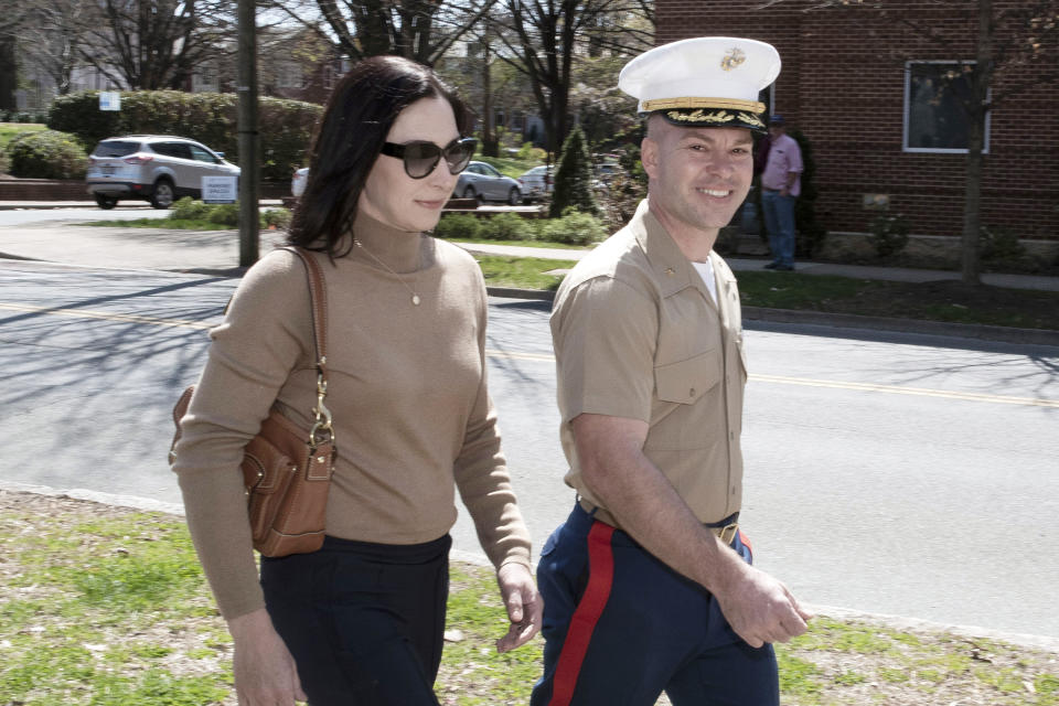 FILE - Marine Maj. Joshua Mast and his wife, Stephanie, arrive at Circuit Court, Thursday, March 30, 2023 in Charlottesville, Va. The U.S. government has warned a Virginia judge that allowing Marine Maj. Joshua Mast and his wife to keep an Afghan war orphan risks violating international law and could be viewed around the world as “endorsing an act of international child abduction,” according to secret court records reviewed by The Associated Press. (AP Photo/Cliff Owen, File)