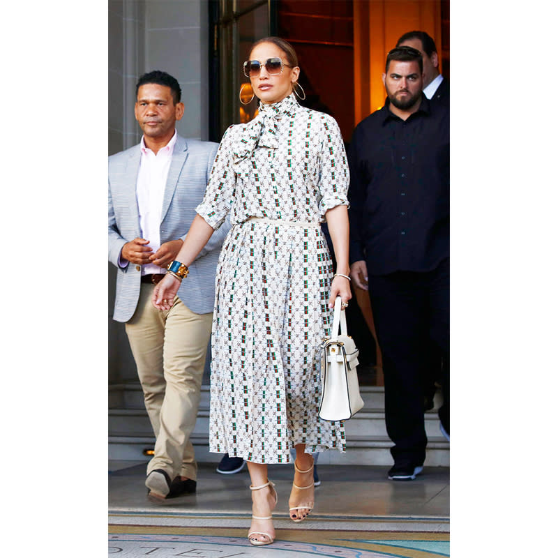 In Gucci With Elie Saab Sunglasses And Jennifer Fisher Earrings