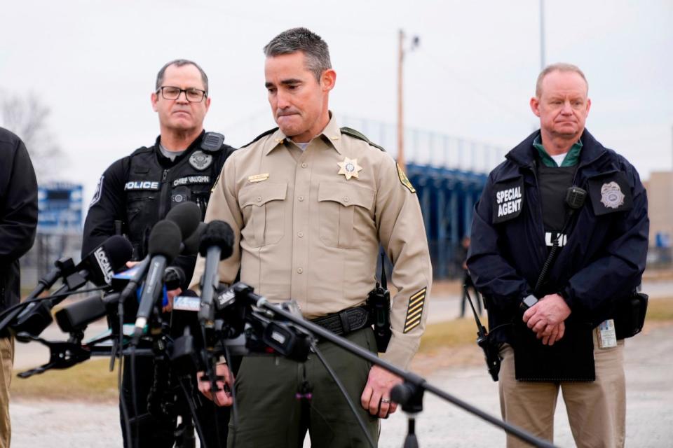 PHOTO: Dallas County (Iowa) Sheriff Adam Infante, center, pauses before speaking outside Perry High School in Perry, Iowa., Jan. 4, 2024, after a shooting at the city's high school. (Andrew Harnik/AP)