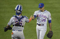 New York Mets relief pitcher Edwin Diaz (39) and catcher Robinson Chirinos, left, celebrate after a baseball game against the Washington Nationals, Thursday, Sept. 24, 2020, in Washington. The Mets won 3-2. (AP Photo/Nick Wass)