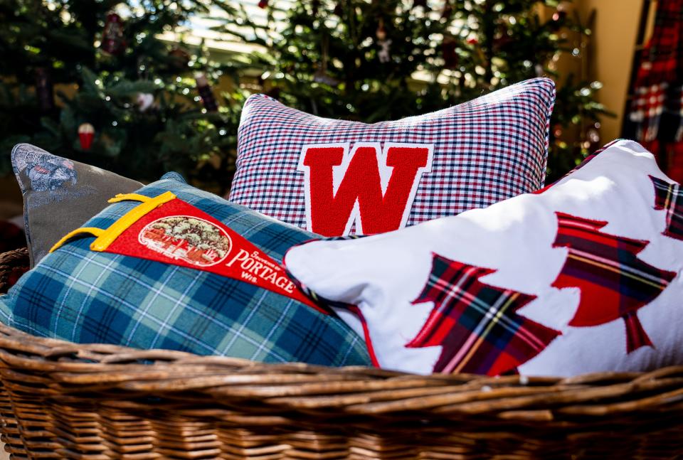 Julie Hunt makes decorative pillows out of a wide variety of fabrics, including varsity letters and pennants, and her pieces will be featured on this year's Monches Artisans Holiday Open House Tour, on Saturday November 11, 2023 in Hartland, Wis.