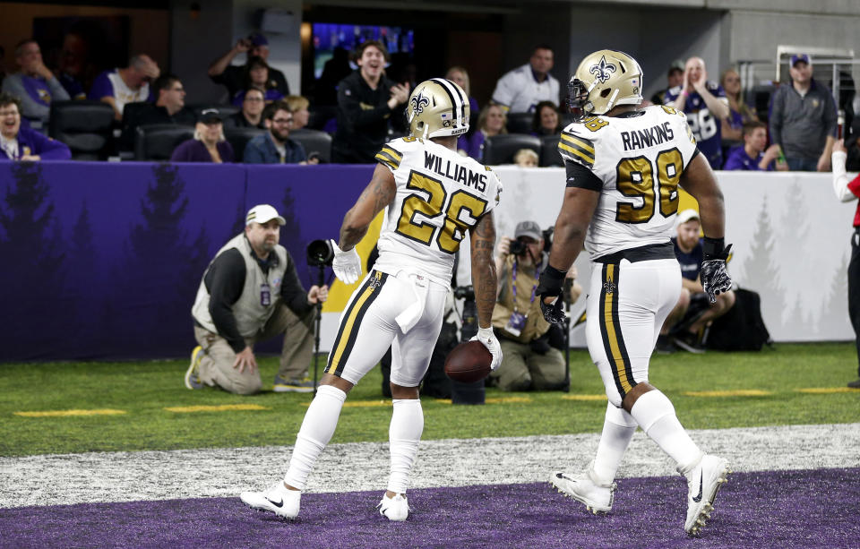 Saints players celebrating a touchdown against the Vikings Sunday got pelted with a beer can from the stands. (AP)