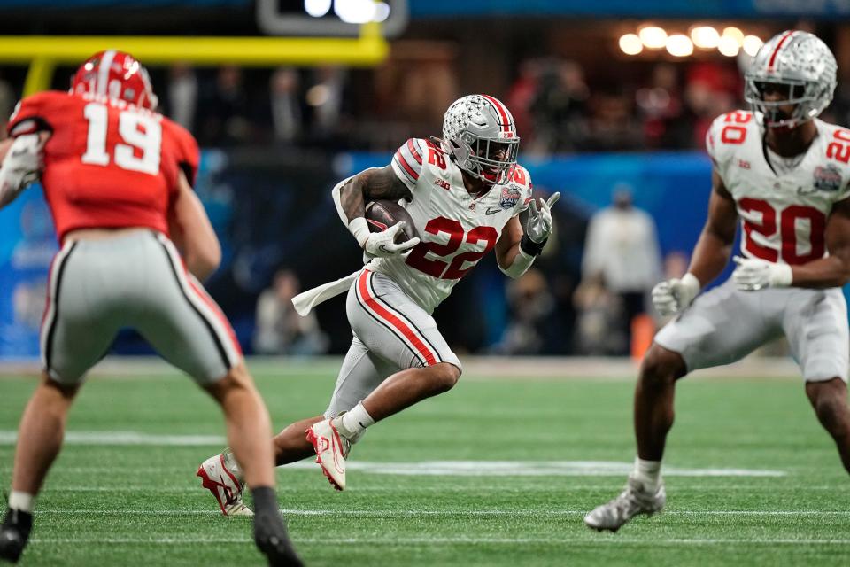 Dec 31, 2022; Atlanta, Georgia, USA; Ohio State Buckeyes linebacker Steele Chambers (22) intercepts a pass from Georgia Bulldogs quarterback Stetson Bennett during the first half of the Peach Bowl in the College Football Playoff semifinal at Mercedes-Benz Stadium. Mandatory Credit: Adam Cairns-The Columbus Dispatch