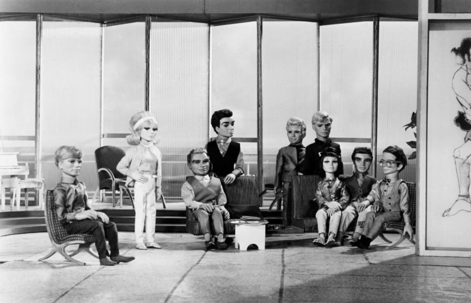 The Tracy family and allies of International Rescue, the heros of the futuristic "Supermarionation" tv show Thunderbirds.