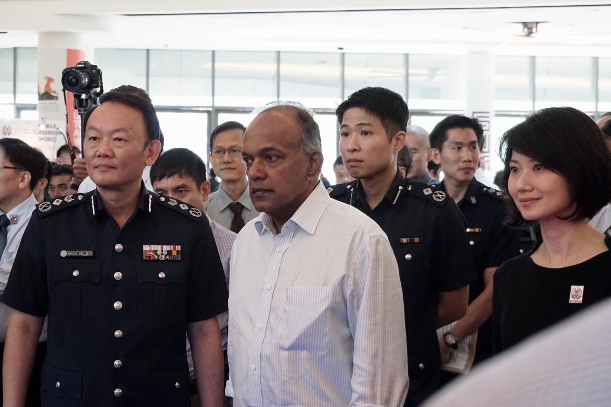 (Foreground, from left) Commission of Police Hoong Wee Teck, Law and Home Affairs Minister K Shanmugam and Senior Parliamentary Secretary for Home Affairs and National Development Sun Xueling at the Police Workplan Seminar on Thursday (3 May). (PHOTO: Dhany Osman / Yahoo News Singapore)