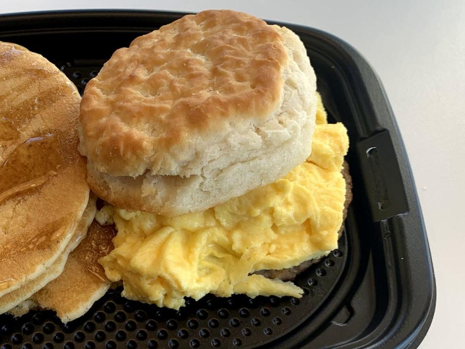 A biscuit and scrambled eggs from McDonald's.