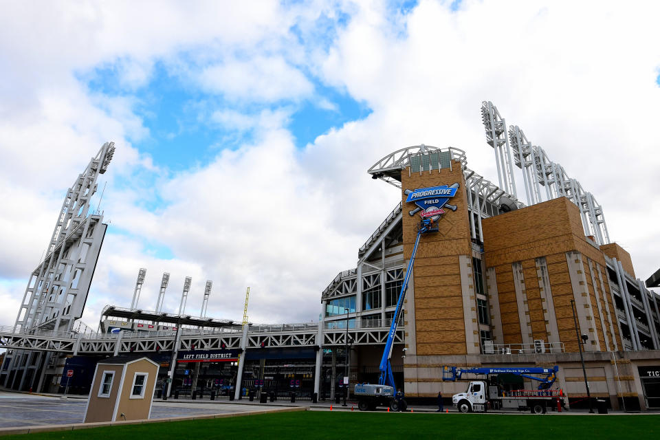CLEVELAND, OHIO - NOVEMBER 19: Staff members put up Cleveland Guardians signage on the side of the stadium at Progressive Field on November 19, 2021 in Cleveland, Ohio. The Cleveland Indians officially changed their name to the Cleveland Guardians on Friday. (Photo by Emilee Chinn/Getty Images)