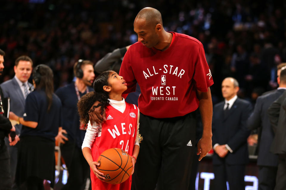 Kobe Bryant warms up with daughter Gianna Bryant during the NBA All-Star Game 2016 at the Air Canada Centre on February 14, 2016 in Toronto, Ontario. (Photo by Elsa/Getty Images)