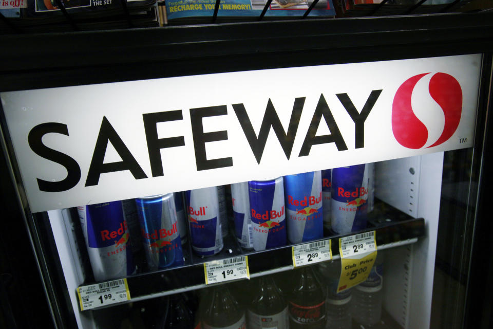 FILE - In this photo made, June 21, 2010 file photo, Red Bull and other drinks are on display at a Safeway in San Ramon, Calif. Safeway has agreed to be acquired by an investment group led by Cerberus Capital Management, the owner several supermarket chains. The acquisition of is worth about $7.64 billion in cash, and pending other transactions could top more than $9 billion. The deal, announced late Thursday,March 6, 2014, will bring together Safeway and Albertsons, one of the five chains that Cerberus bought from Supervalu Inc. last year. (AP Photo/Paul Sakuma, File)