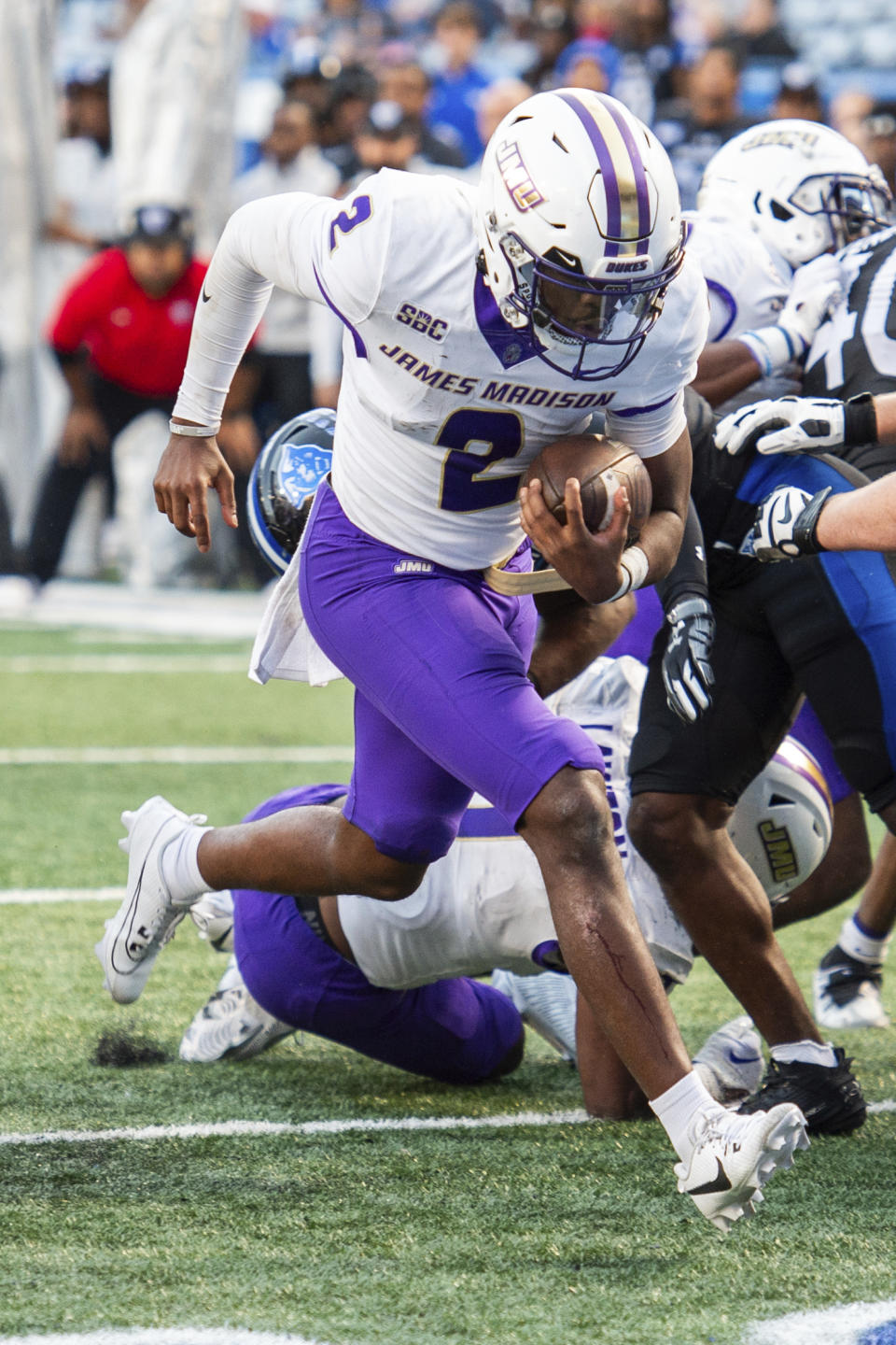 James Madison quarterback Jordan McCloud (2) scores a rushing touchdown in the second half of an NCAA college football game against Georgia State, Saturday, Nov. 4 2023, in Atlanta. (AP Photo/Hakim Wright Sr.)