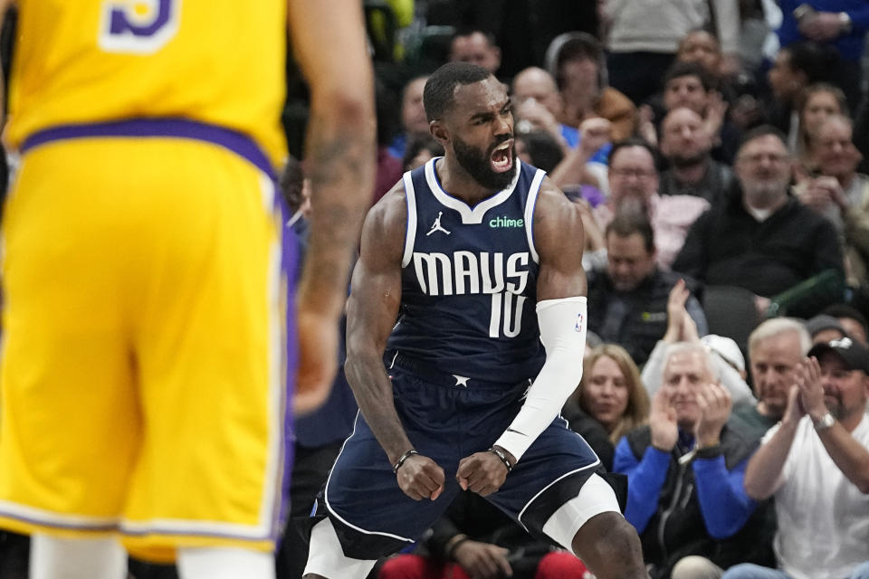 Dallas Mavericks forward Tim Hardaway Jr. reacts to scoring late in the second half of an NBA basketball game against the Los Angeles Lakers in Dallas, Tuesday, Dec. 12, 2023. (AP Photo/LM Otero)