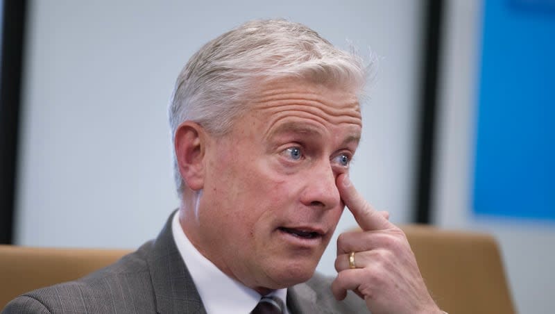 U.S. Senate candidate Jason Walton wipes tears from his eye while speaking about his daughter during a Deseret News Editorial Board meeting at the Deseret News office in Salt Lake City on Thursday, April 11, 2024.