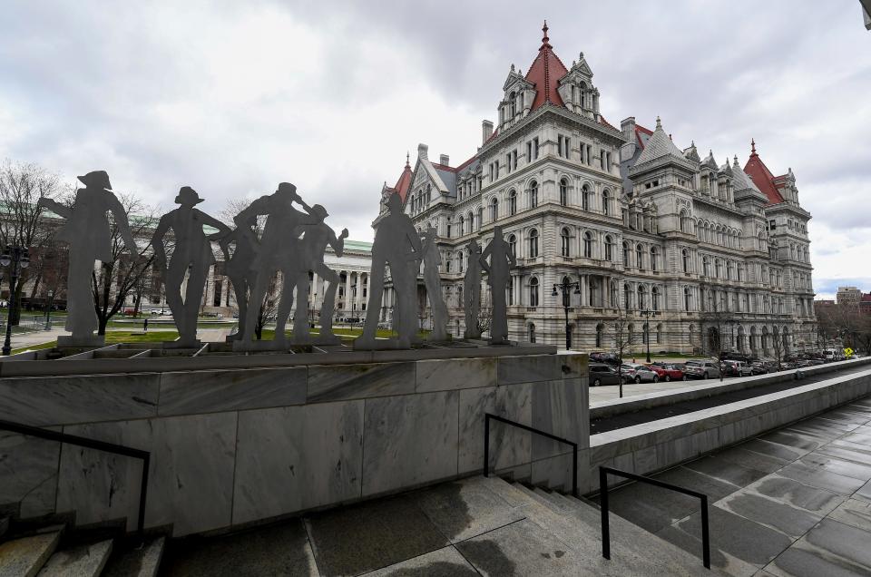 View of the the New York state Capitol, Friday, April 8, 2022, in Albany, N.Y.  New York’s legislature is working to polish off a state budget that commits billions of dollars to social programs and bolsters health care workers, and also tinkers with rules governing when criminal defendants can be jailed before a trial.  (AP Photo/Hans Pennink) ORG XMIT: NYHP101