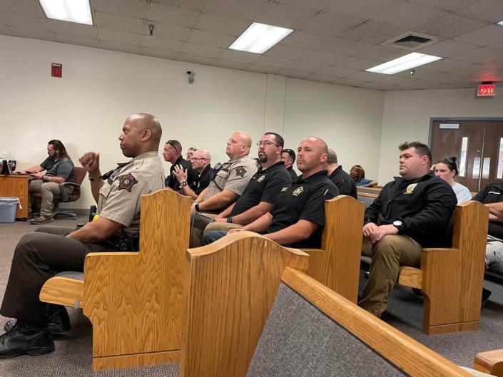 Deputies with the Scott County Sheriff’s Office pack the courtroom in support of a fallen deputy, Caleb Conley, who was killed in the line of duty last week during a traffic stop.