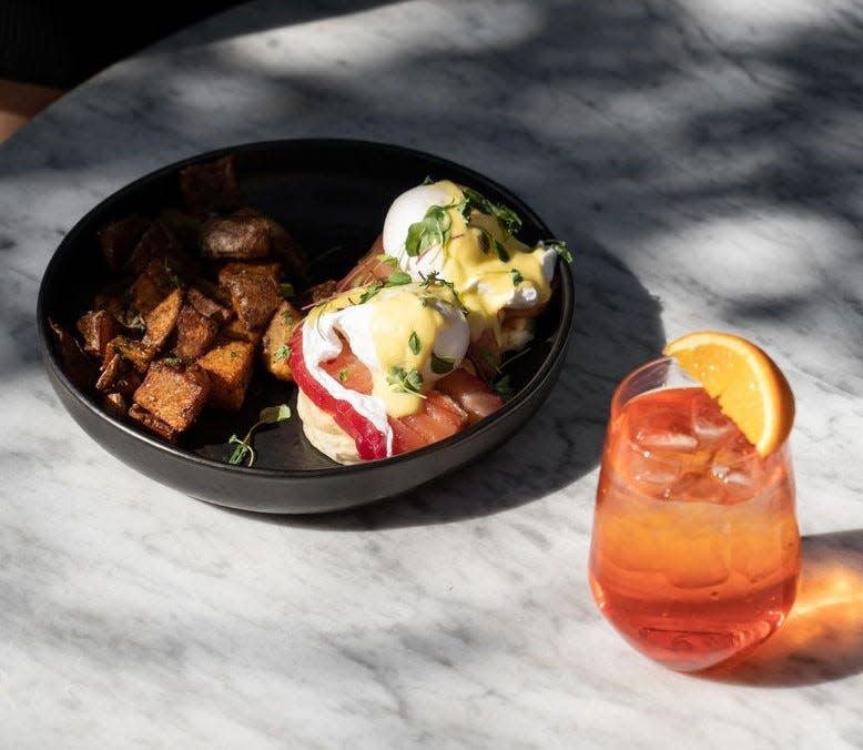 The brunch menu at Dram Yard restaurant in downtown Wilmington includes the Salmon Gravlax, with a poached egg, hollandaise and breakfast potatoes.