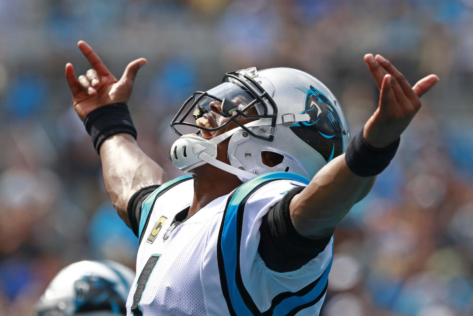 Carolina Panthers' Cam Newton (1) reacts to his touchdown pass against the Cincinnati Bengals during the first half of an NFL football game in Charlotte, N.C., Sunday, Sept. 23, 2018. (AP Photo/Jason E. Miczek)