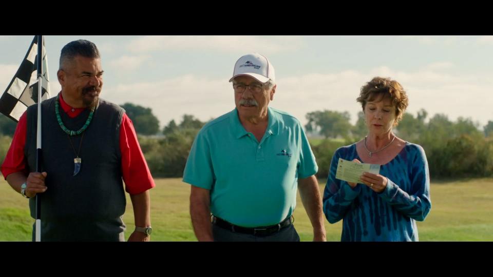 Herb (George Lopez) tends to the pin as Joe (Edward James Olmos) eyes a putt and wife Sheila (Kathleen Quinlan) keeps score.