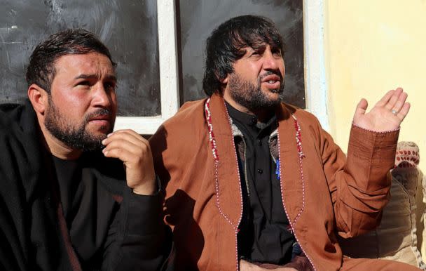 PHOTO: In this Dec. 14, 2021, file photo, Ajmal Ahmadi, right, a brother of Zemerai Ahmadi, speaks during an interview with The Associated Press at the Ahmadi family home, in Kabul, Afghanistan. (Khwaja Tawfiq Sediqi/AP, FILE)