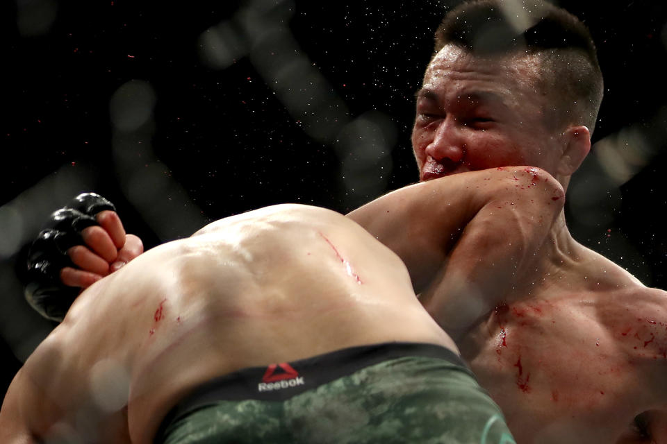 Chan Sung Jung is hit with an elbow by Yair Rodríguez to end their featherweight bout during UFC Fight Night 139 at the Pepsi Center on Nov. 10, 2018 in Denver, Colorado. (Getty Images)