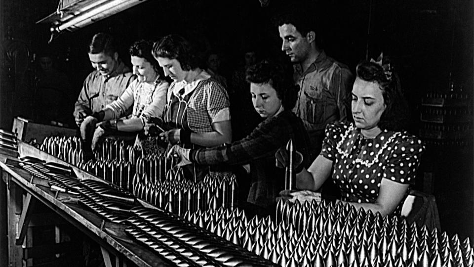women making aluminum shells for WWII