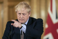 Prime Minister Boris Johnson gives a press conference about the ongoing situation with the COVID-19 coronavirus pandemic at 10 Downing Street in London, Monday March 16, 2020. According to the World Health Organization, the vast majority of people recover from the new COVID-19 coronavirus in about two to six weeks depending on the severity of the illness. (Richard Pohle/Pool via AP)