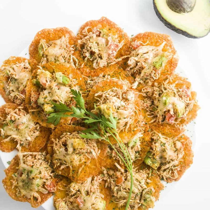 Spicy chicken nachos are made even better when cheese crisps are used as nacho chips!